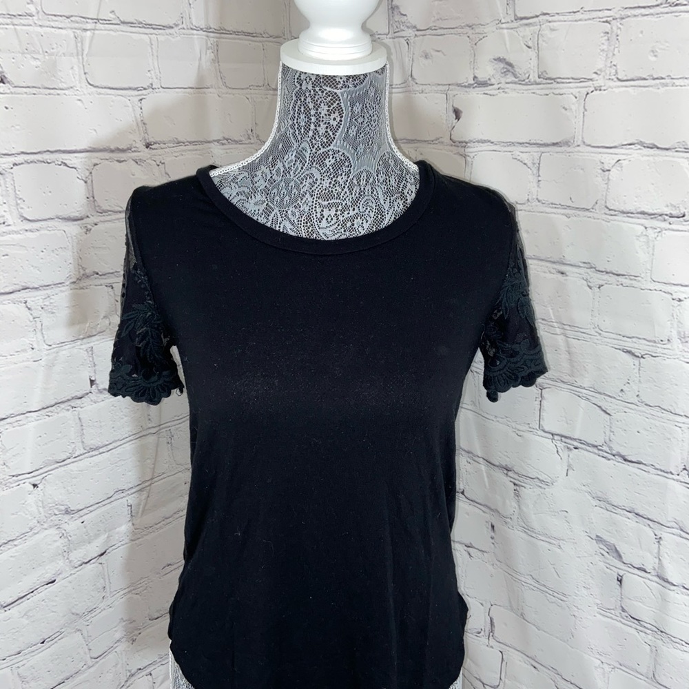 Black top with laced sleeves